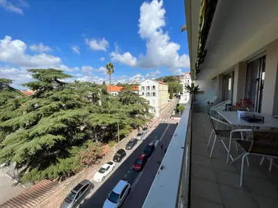 a balcony with a view of a city street at B049-Appartement lumineux à deux pas de la Croisette in Cannes