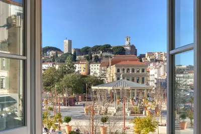 a view of a city from a window at IMMOGROOM - Appartements luxueux - 2min du Palais - Vue mer - Clim in Cannes