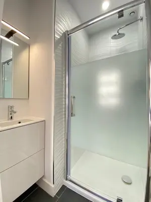 a bathroom with a shower and a sink at Beautiful 2 bedrooms 2 bathrooms Center of Cannes in Cannes