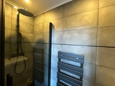 a bathroom with a shower and a sink at Appartements Centre Cannes in Cannes