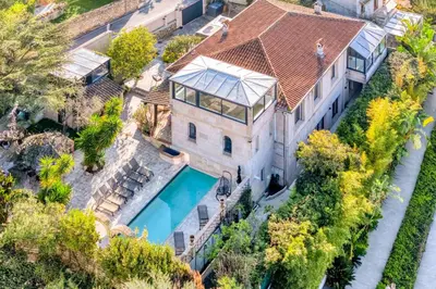 an aerial view of a house with a swimming pool at REF 2134 - Cannes - Magnificent villa for rent in Cannes