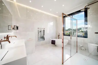 a bathroom with a shower and a toilet and a sink at REF 2134 - Cannes - Magnificent villa for rent in Cannes