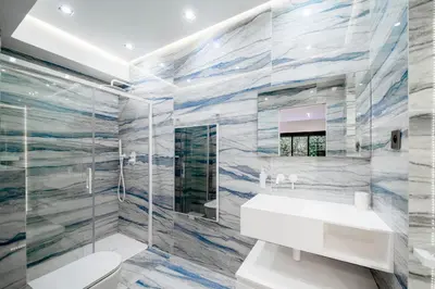 a bathroom with a white sink and a mirror at REF 2134 - Cannes - Magnificent villa for rent in Cannes