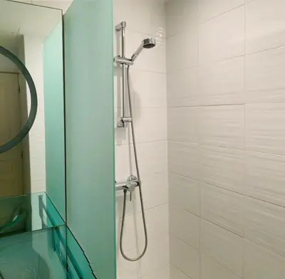 a shower with a shower head in a bathroom at Studio Cannes Croisette in Cannes