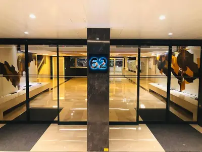 a hallway of a building with a sign with the number at Studio Cannes Croisette in Cannes