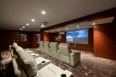 a room with a bunch of chairs and a flat screen tv at REF 2135 - Cannes - Villa for rent in Cannes