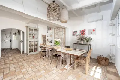 a large dining room with a table and chairs at Villa Palma near the beaches Cannes in Cannes