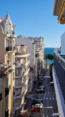 a small kitchen with a sink and a microwave at Studio for 2 near the Croisette central with balcony 133 in Cannes