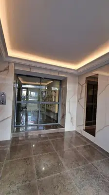 a white toilet in the corner of a bathroom at Studio for 2 near the Croisette central with balcony 133 in Cannes