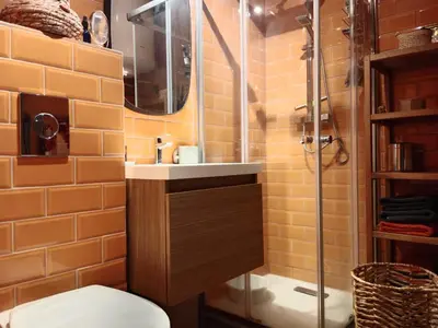 a bathroom with a shower and a toilet and a sink at STUDIO VILLA VIANNEY in Cannes