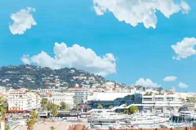 a view of a city with boats in a harbor at 5mn Palais des festivals - Vue sur le Port - BS in Cannes
