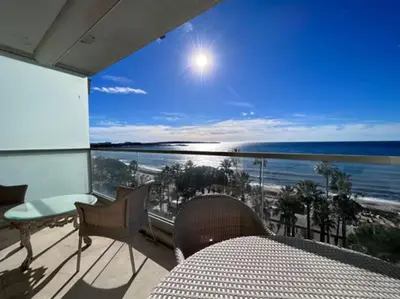 a balcony with a view of the beach and the ocean at Cannes appart 3 chambres luxe - Impératrice in Cannes