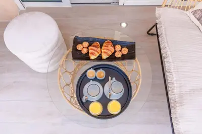 a tray of food on a table with sushi at Le Maubourg - Hypercentre - 150m Croisette - AC in Cannes