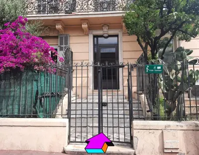 a colorful umbrella in front of a house at Studio hyper centre Cannes - Tout à pied in Cannes