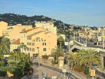 a view of a city with buildings and palm trees at Studio hyper centre Cannes - Tout à pied in Cannes