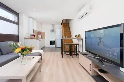 a living room with a large flat screen tv at Le Val By ApiRent #Duplex #Climatisation in Le Cannet