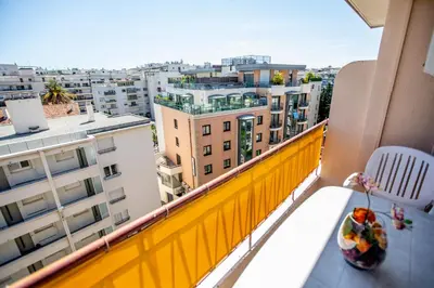 a balcony with a view of a city at Comfort 6 People Apartment by Connexion in Cannes