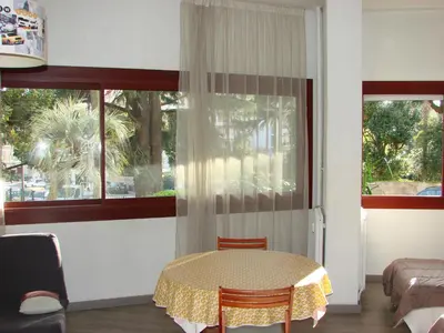 a room with a table and a window at ACCI Cannes Gallia in Cannes