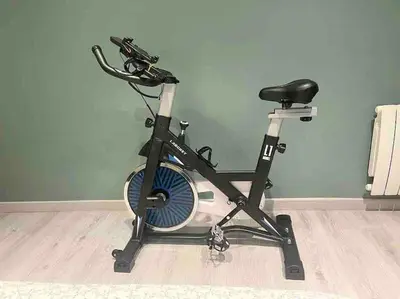 a bike parked in a room with a fan at MARIE ANTOINETTE in Cannes