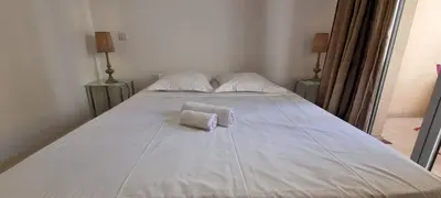 a living room with a couch and a table at Vieux Port One Bedroom Apartment B22 in Cannes