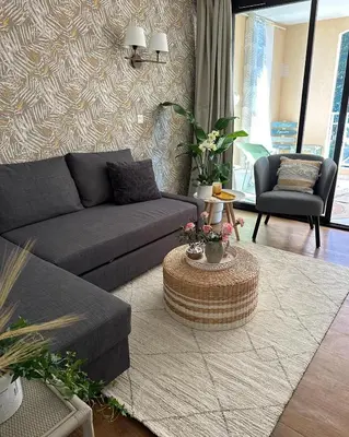 a living room with a couch and a table at Villa Francia Cannes in Cannes