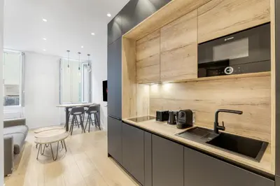 a kitchen with a sink and a counter at 1 Chambre Modern L- Calme - Hypercentre à 2 minutes du Palais in Cannes
