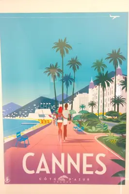 a poster of a couple walking on a beach at Cannes Croisette - 4 Personnes - Vue mer in Cannes