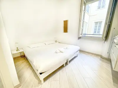a living room with a couch and a table at Tony Allard By Winsome Destination 2E in Cannes