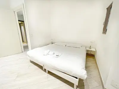 a bathroom with a toilet and a sink and a mirror at Tony Allard By Winsome Destination 2E in Cannes