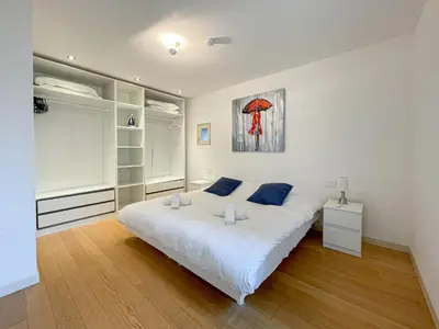 a kitchen and a living room with a table and chairs at Tony Allard By Winsome Destination 3D in Cannes