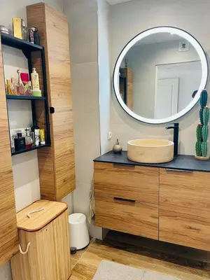 a bathroom with a sink and a mirror at Appartement T3 Cannes centre in Cannes