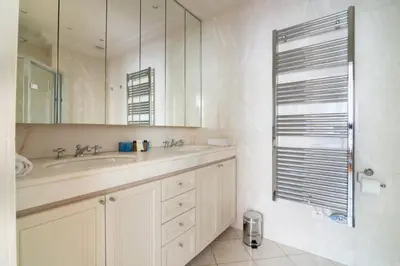 a bathroom with a sink and a mirror at C096-Apt overlooking the Old Port the view is magical in Cannes