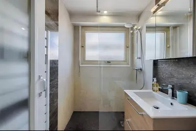 a bathroom with a sink and a shower and a window at B045-Studio croisette AC close Congress center SEA in Cannes