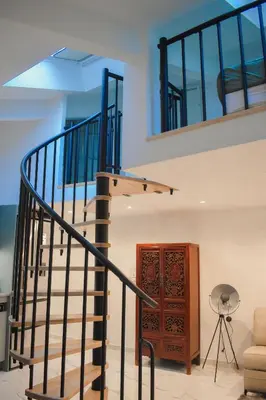 a staircase leading up to the second floor of a house at STA5 Cannes, le suquet in Cannes
