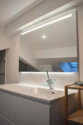 a bathroom with a mirror and a sink at STA5 Cannes, le suquet in Cannes