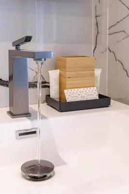 a desk with a computer keyboard and a microscope at Le Louis Blanc - Hypercentre - 100m Suquet - AC in Cannes