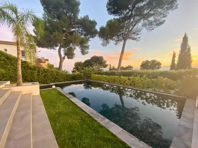 a swimming pool in the yard of a house at Villa Lion, gorgeous villa in Le Cannet overlooking Cannes in Le Cannet