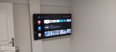 a flat screen tv hanging on a wall at Cannes carnot in Cannes