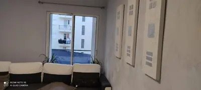 a room with chairs and a window with a view at Cannes carnot in Cannes