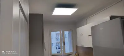 a room with a window and a ceiling with a light at Cannes carnot in Cannes