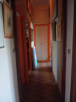 a hallway of a room with a hallway at Chambre d hôte artistique cannes in Cannes