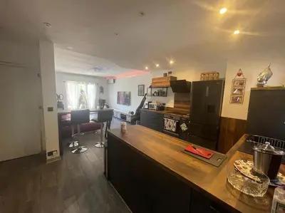 a kitchen with a counter top in a room at Cannes Cosy Oasis in Cannes