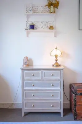 a white dresser with a lamp on top of it at Le Sorbier By ApiRent #Wifi #Climatisation #Lumineux in Cannes