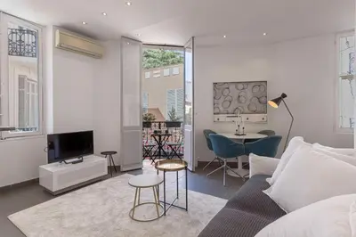 a living room with a couch and a tv at 