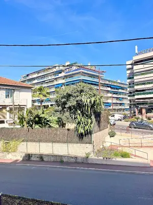 a building on the side of a city street at Appartement 3 pièces GREEN ART **** in Le Cannet