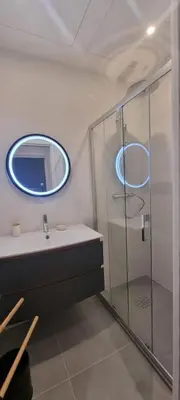 a bathroom with a sink and a mirror at M.M.R. Gioma in Cannes