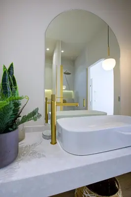 a bathroom with a large white tub in front of a mirror at Jessicannes - ALBA - Plage et Palais des Festival à pied in Cannes