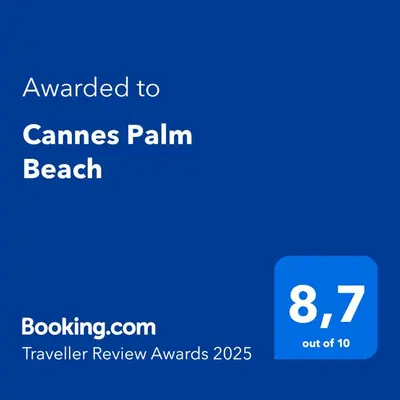 a screenshot of a cell phone with the text awarded to games palms beach at Cannes Palm Beach in Cannes