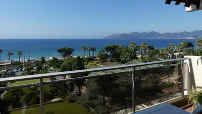 a view of the ocean from a balcony at Apartment Montmorency in Cannes