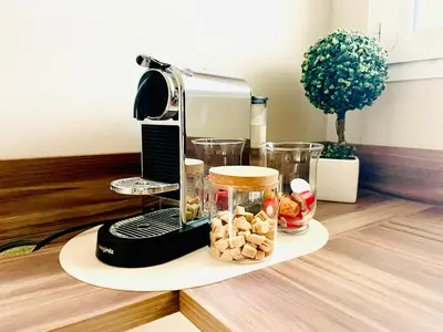 a blender sitting on top of a table with food at Appartement 2 pièces à Cannes in Cannes